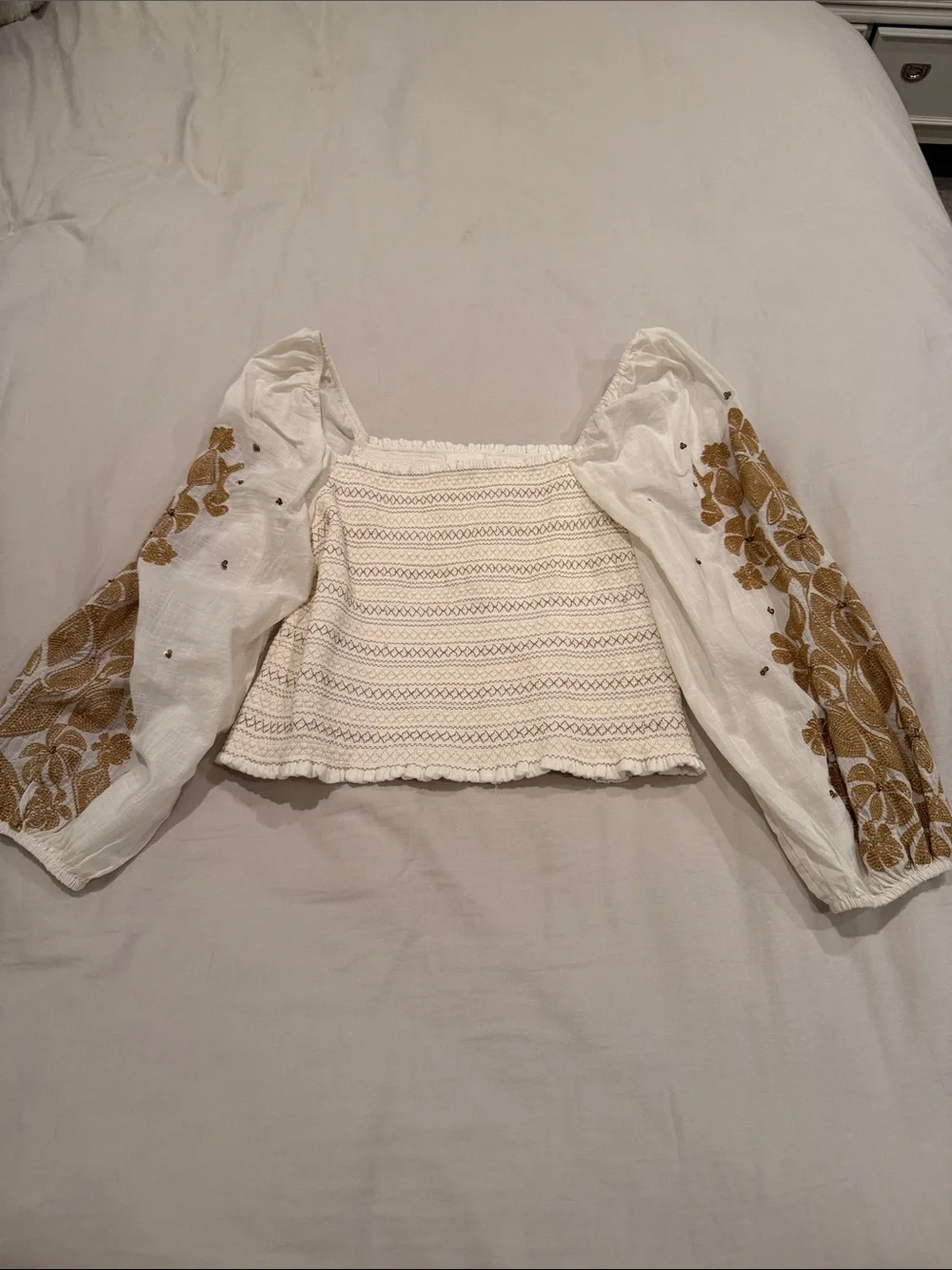 Anthropologie White Cropped Smocked Top with Mustard Floral Sleeves